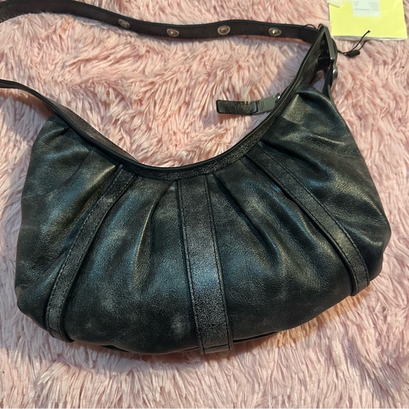 Marc Jacobs
The Distressed Buckle J Marc Crescent bag - Picture 7 of 12